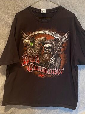 Duck Commander Graphic Short Sleeve Tee in Black with Orange and Green Accents